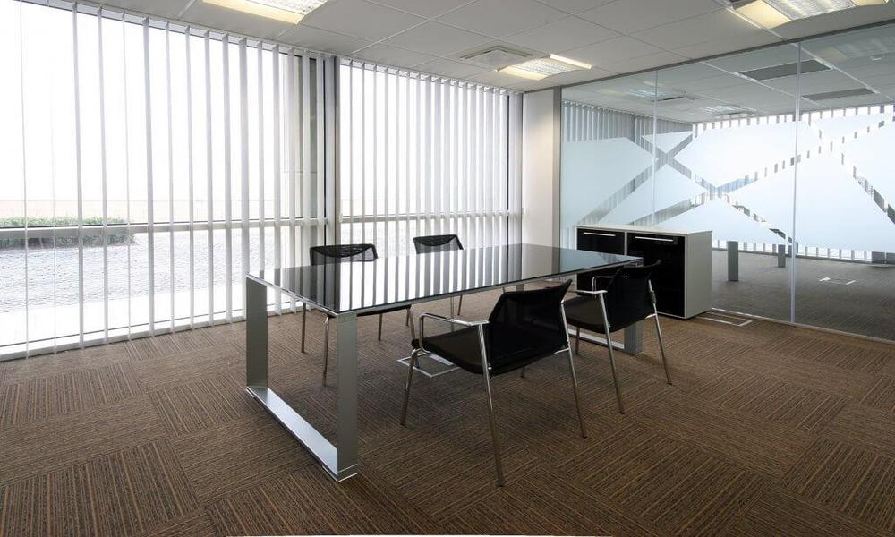 What are the benefits of office curtains in interior design